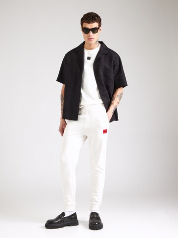 Tapered Pantaloni 'Doak' di HUGO in bianco