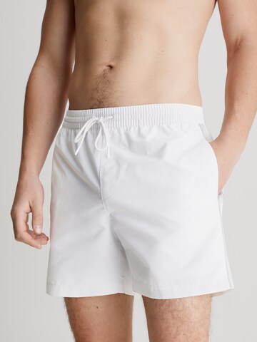 Calvin Klein Swimwear Board Shorts in White: front