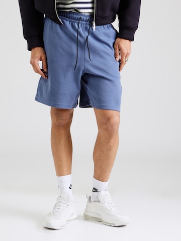 Nike Sportswear Loosefit Broek 'FLC' in Blauw: voorkant