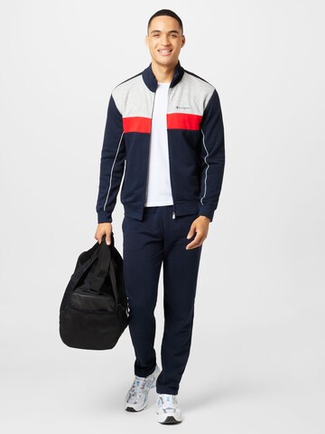 Champion Authentic Athletic Apparel Trainingspak in Blauw