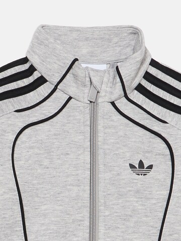 Tuta da jogging 'TS' di ADIDAS ORIGINALS in grigio