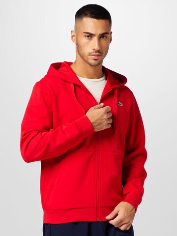 Veste de survêtement Lacoste Sport en rouge : devant