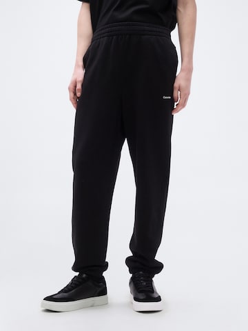 Effilé Pantalon 'NANO' Calvin Klein en noir : devant