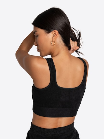 OCEANSAPART Bralette Sports bra 'Beauty' in Black: front