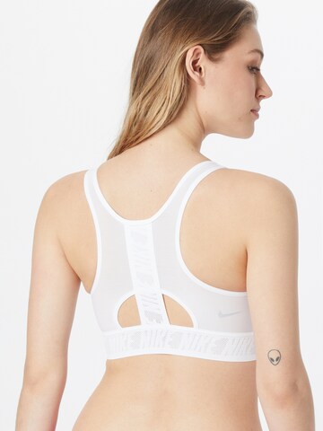 Bustino Reggiseno sportivo 'UltraBreathe' di NIKE in bianco