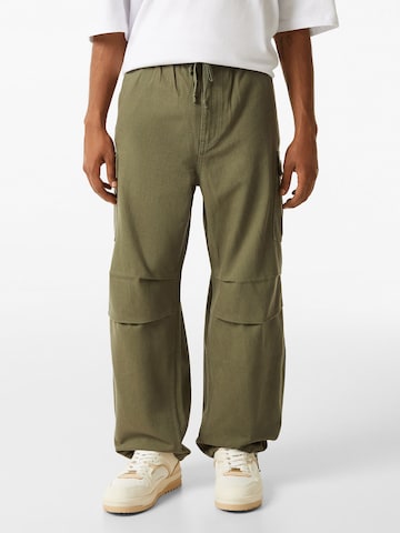 Loosefit Jeans cargo Bershka en vert : devant