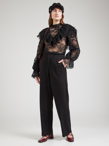 Wide leg Pantaloni con piega frontale di s.Oliver in nero