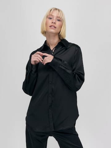 UNFOLLOWED x ABOUT YOU Blouse 'BOSSY' in Black: front
