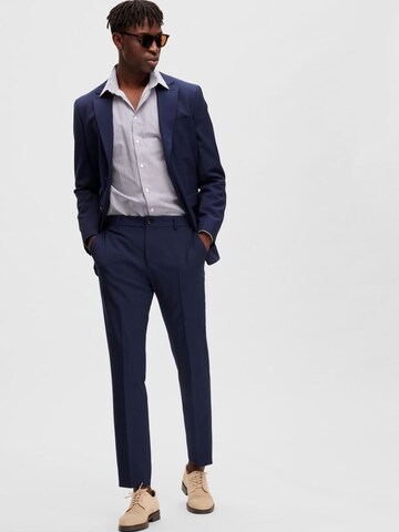 Coupe slim Pantalon à plis SELECTED HOMME en bleu