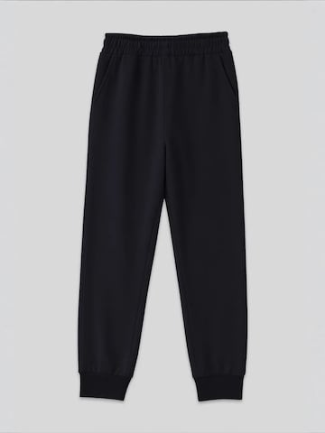 Pantalon de sport 'Jogginghose' Tommy Life en noir : devant