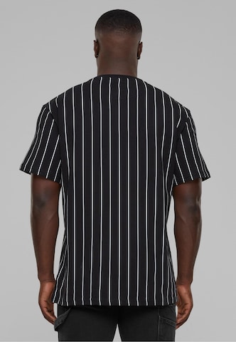 Karl Kani T-Shirt in Schwarz