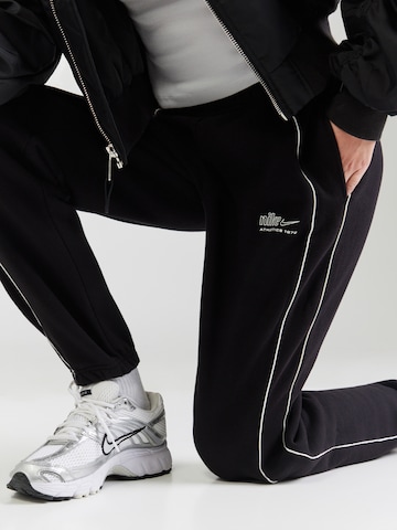 Nike Sportswear Tapered Pants 'STDO FLC' in Black
