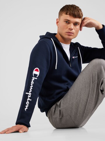 Champion Authentic Athletic Apparel Sweatshirt i blå