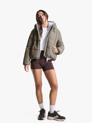 Bershka Between-season jacket in Beige: front