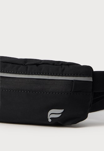 melns Fabletics Sporta jostas soma: no priekšpuses