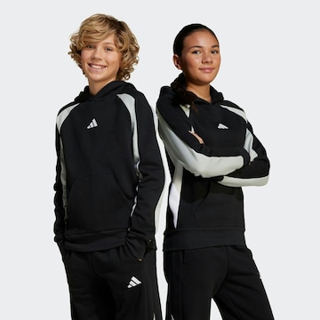 ADIDAS SPORTSWEAR - Camiseta deportiva en negro: frente