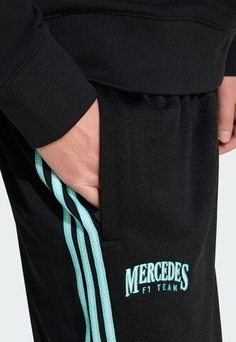 Loosefit Pantaloni sportivi 'Mercedes - Amg Petronas Formula One Team Las Vegas' di ADIDAS PERFORMANCE in nero