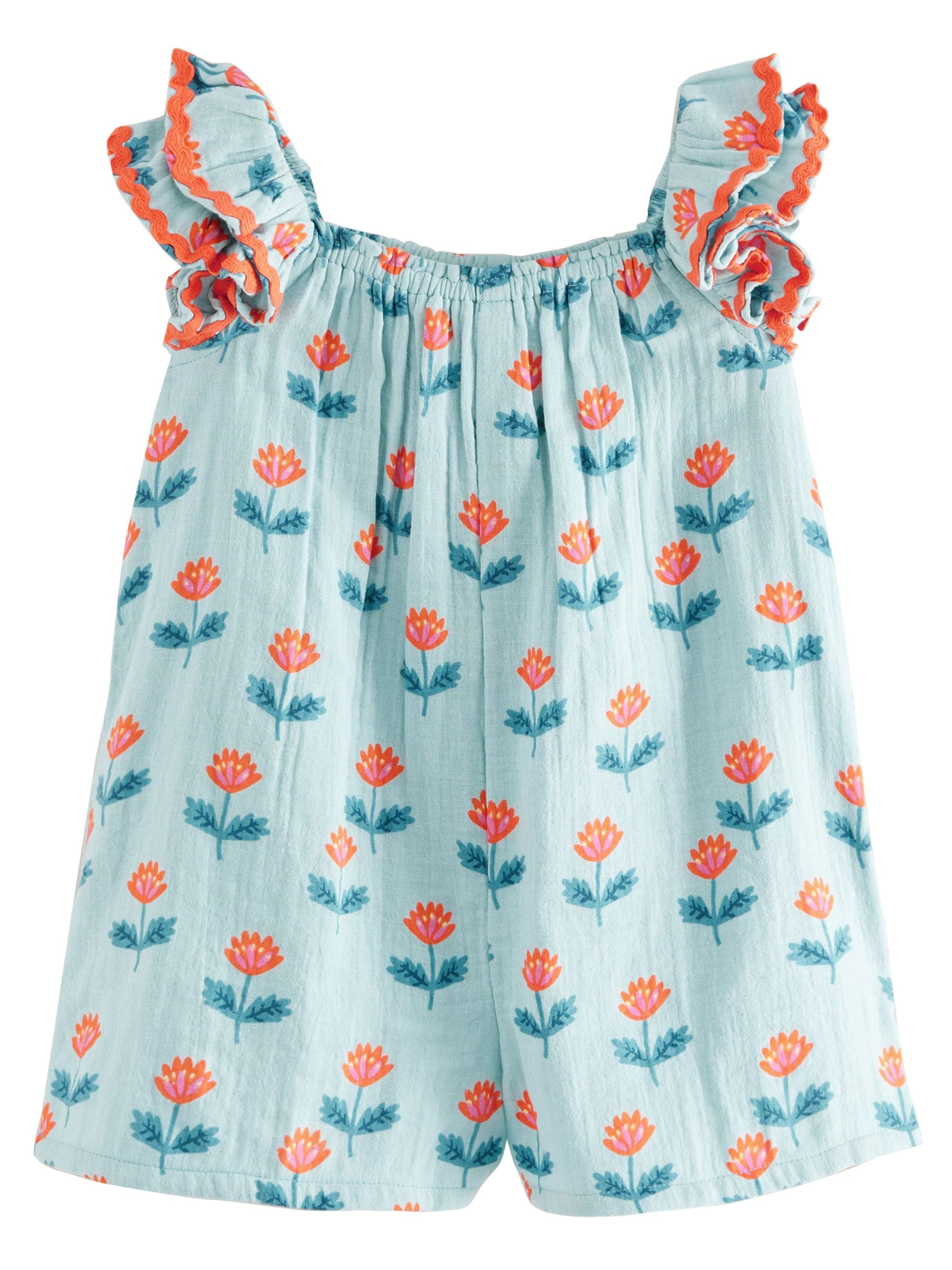 zils Next Kombinezons: no priekšpuses