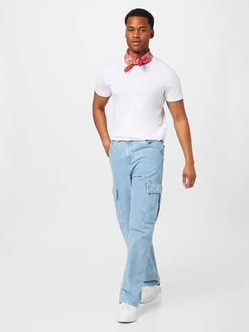 Tommy Jeans جينز واسع جينز فضفاض 'AIDEN' بلون أزرق