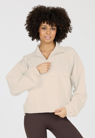Athlecia Performance shirt 'Carley' in Beige: front