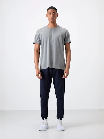 Tommy Life - Tapered Calças de desporto em azul