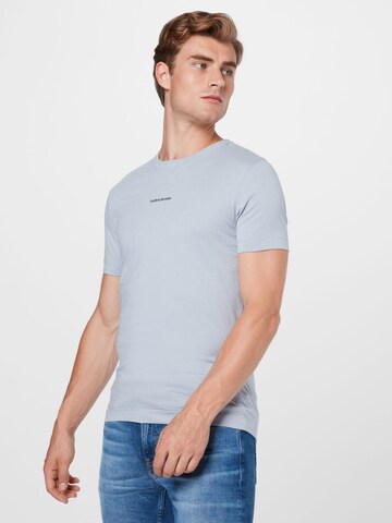 T-Shirt Calvin Klein Jeans en gris : devant