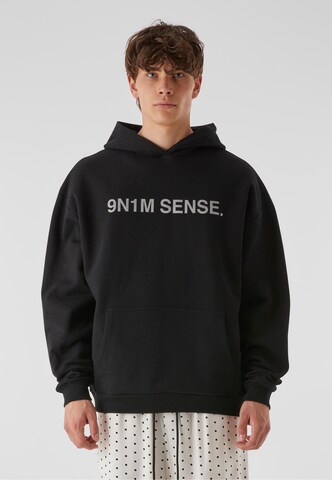 9N1M SENSE Loosefit Shorts in Schwarz: Vorderseite