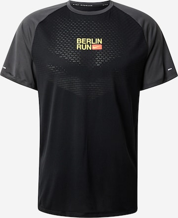 NIKE Toiminnallinen paita 'CITY' värissä musta: etupuoli