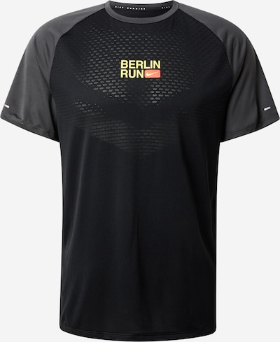 Sportiniai marškinėliai 'CITY' iš NIKE, spalva – šviesiai geltona / tamsiai pilka / raudona / juoda, Prekių apžvalga