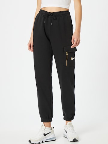 Nike Sportswear Широка кройка Панталон в черно: отпред