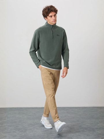 Giacca di pile di Tommy Life in verde