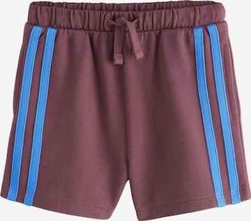 Next Trousers in Red: front