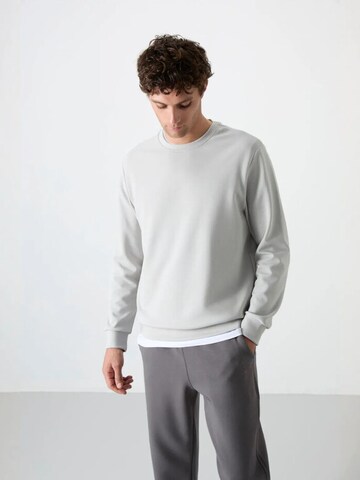 Felpa di Tommy Life in grigio