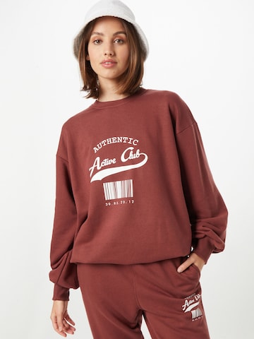 Public Desire Sweatshirt in Brown: front