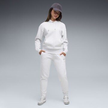 PUMA Tapered Sportbroek 'Essentials' in Wit