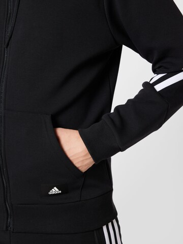 ADIDAS SPORTSWEAR - Sudadera con cremallera deportiva en negro