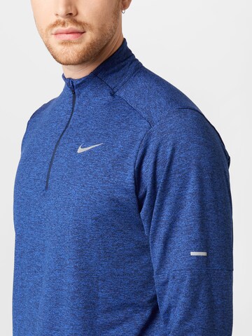 NIKE Sportsweatshirt i blå