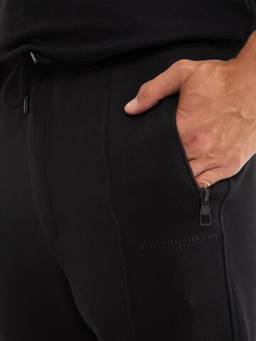 BIG STAR Tapered Broek ' WLADORP ' in Zwart