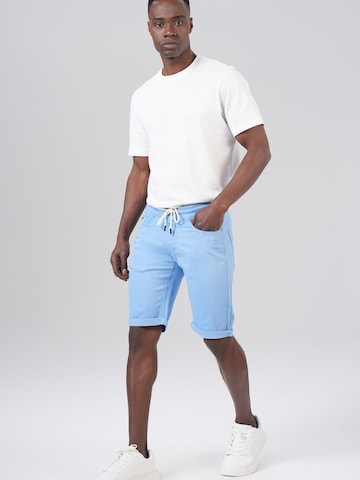 M.O.D MIRACLE OF DENIM Trousers in Blue: front