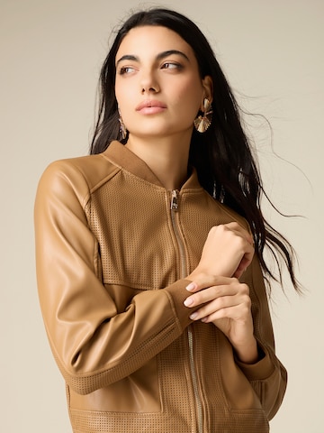 Giacca di mezza stagione di oltre in beige