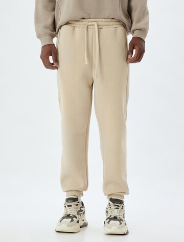 Koton Regular Trousers in Beige: front