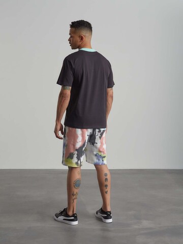 ABOUT YOU x Benny Cristo Regular Pants 'Leo' in Mixed colors