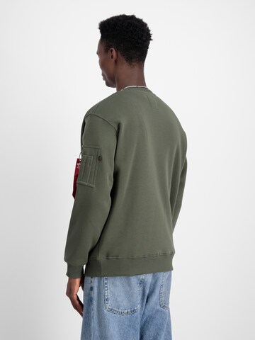 ALPHA INDUSTRIES Sweatshirt in Groen