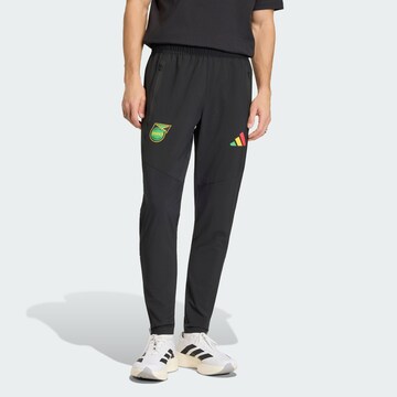 Slimfit Pantaloni sportivi 'Jamaika x Bob Marley Tiro Travel' di ADIDAS PERFORMANCE in nero: frontale