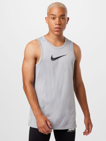 T-Shirt fonctionnel NIKE en gris : devant