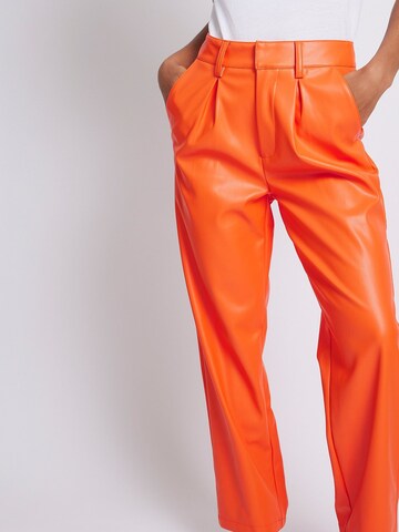 NA-KD Loose fit Pants in Orange