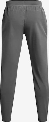 UNDER ARMOUR Tapered Sportbroek in Grijs