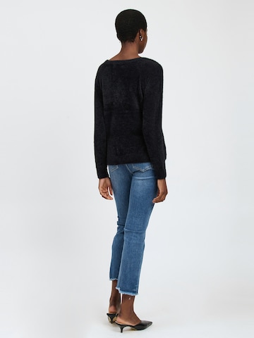 Influencer Sweter w kolorze czarny