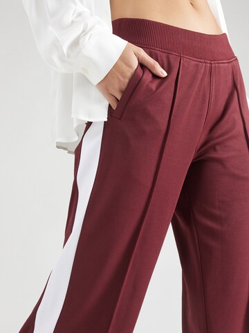 Loosefit Pantaloni di TOMMY HILFIGER in rosso