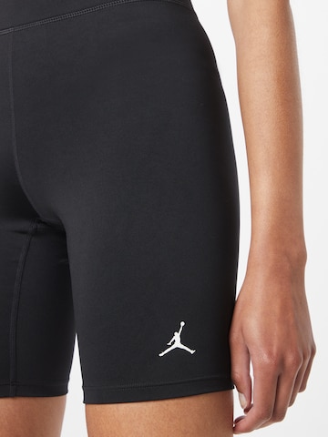 Skinny Pantaloni sportivi di Jordan in nero